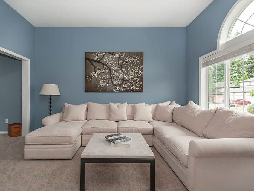 big living room with blue wall